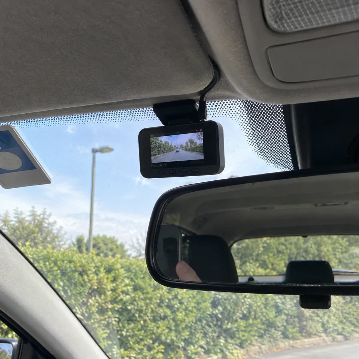 The Halden fitted behind the mirror with the cable tucked into the roof lining