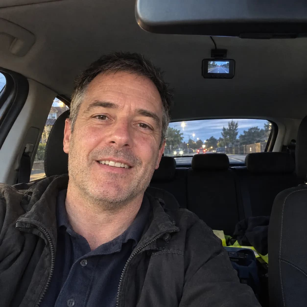 Mark in his car